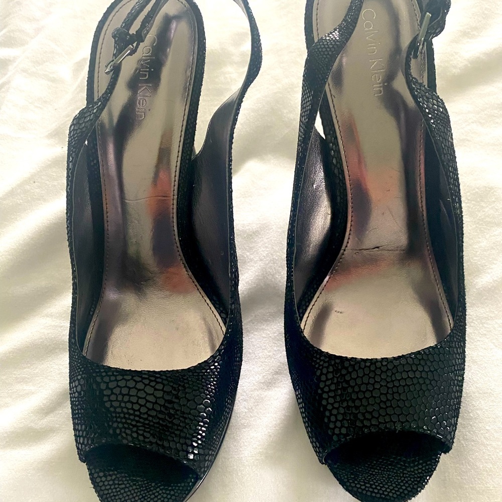 Calvin Klein Black snakeskin stilettos, size 9. Only worn once. Original box!